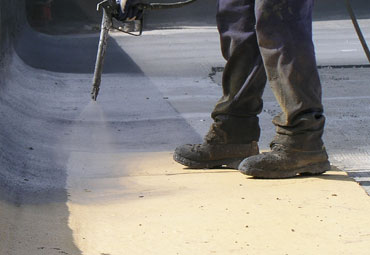 Coating systems over Clarkesville spray foam roof systems